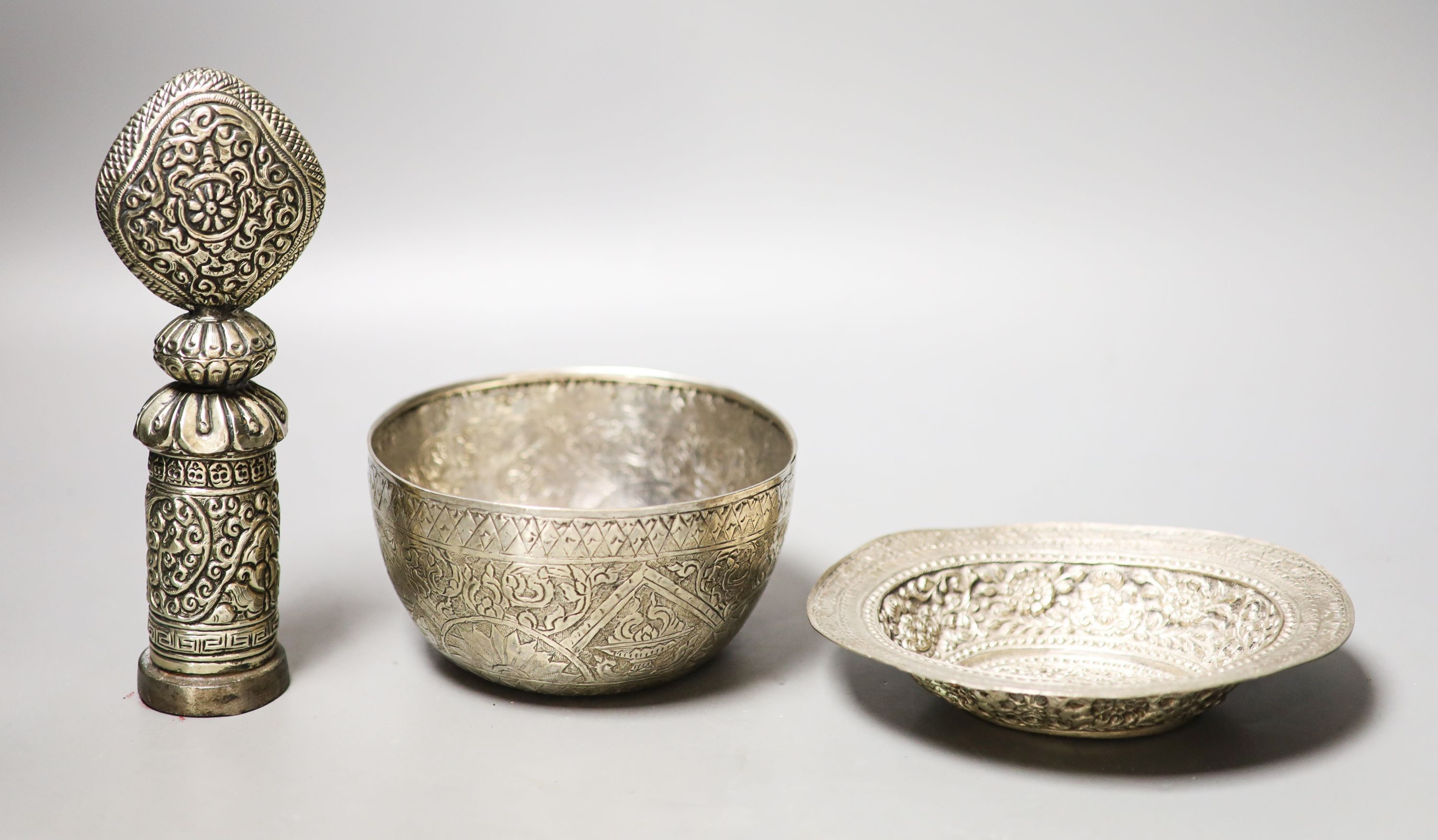 Two Tibetan white metal bowls, similar seal stamp 19cm